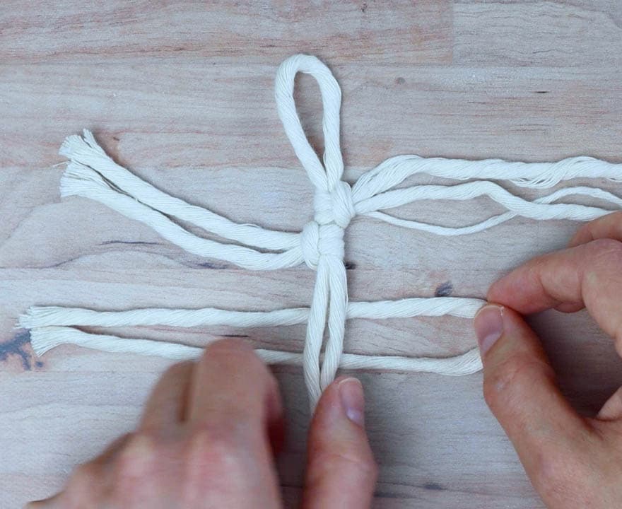 continue tying the pieces of cord on until the feather is as long as you want 
