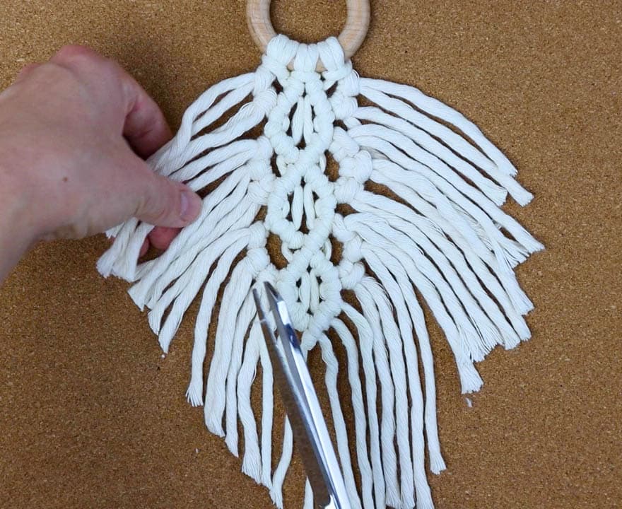 finished feather ready to trim and brush