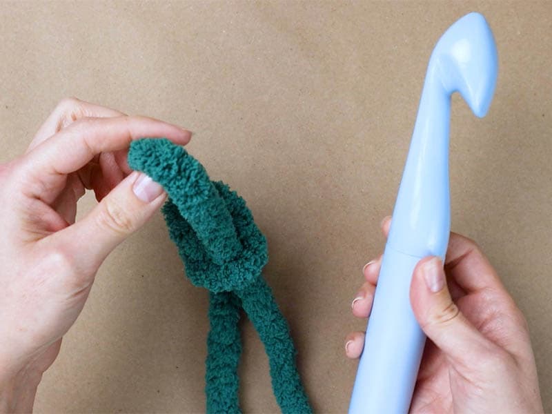 insert the hook into the slip knot and make the foundation chain