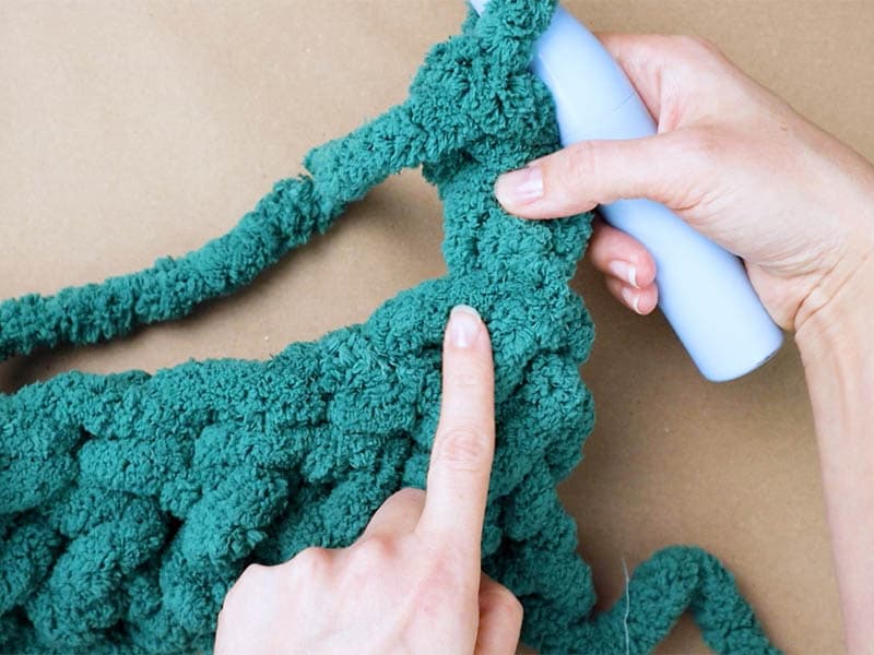 make the first double crochet into the first stitch of the row