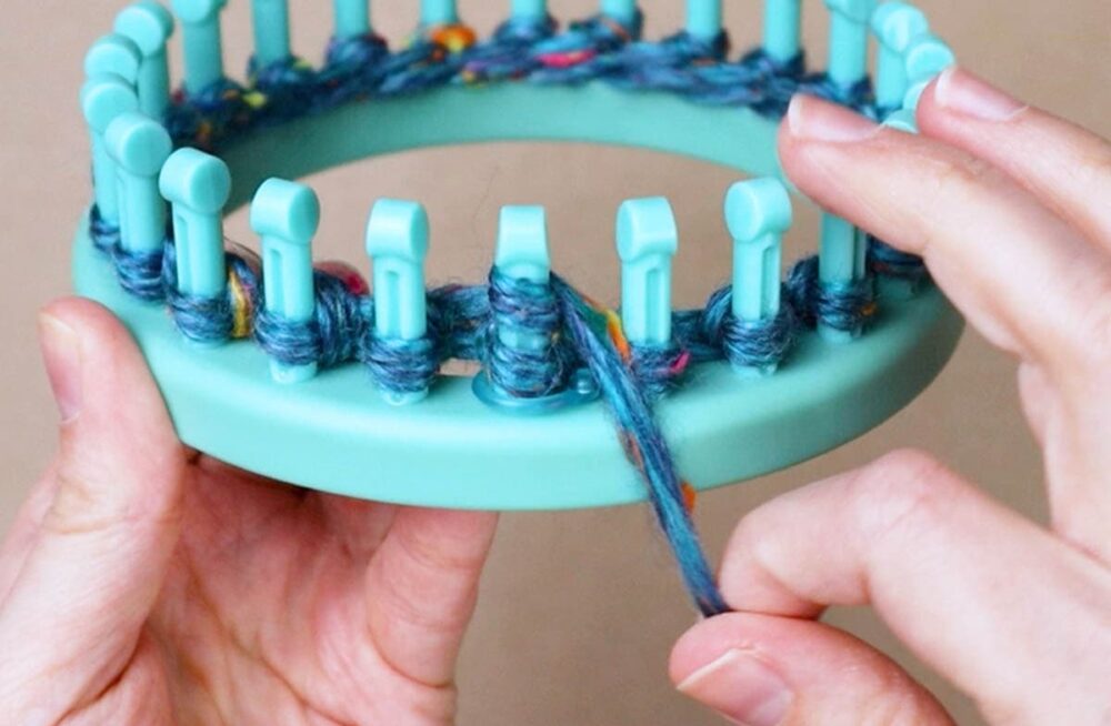 making an ewrap knit stitch for the first peg