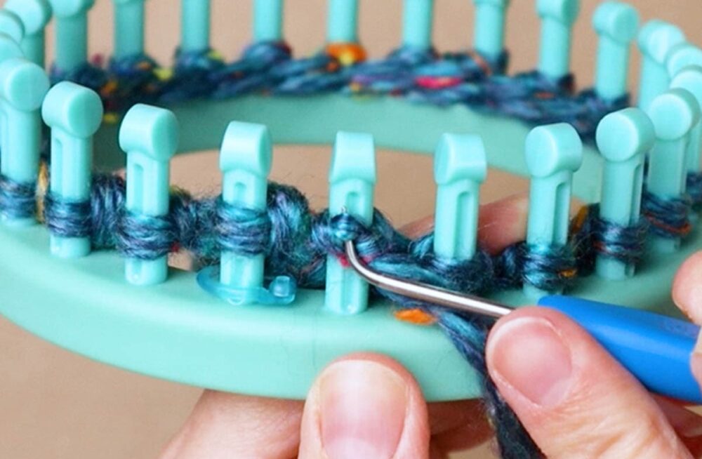 pull a loop up from the bottom