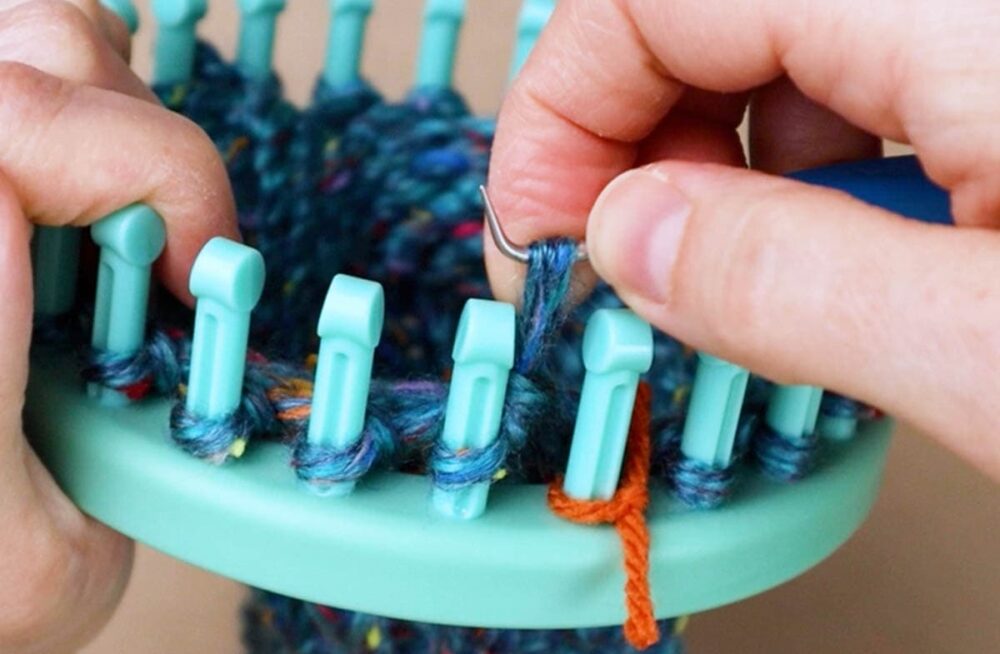 pull the loop off of peg 12