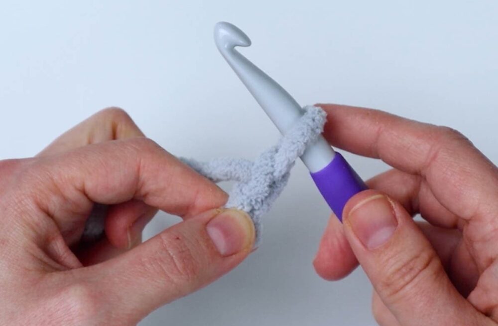 pull the yarn through the loop to make a slip knot