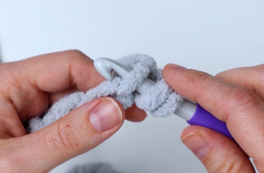 insert hook into the first chain | half double crochet instructions