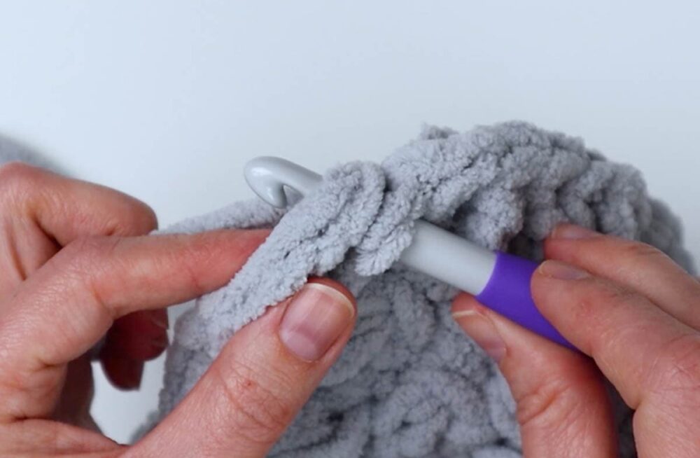 make a slip stitch into the top of chain 3