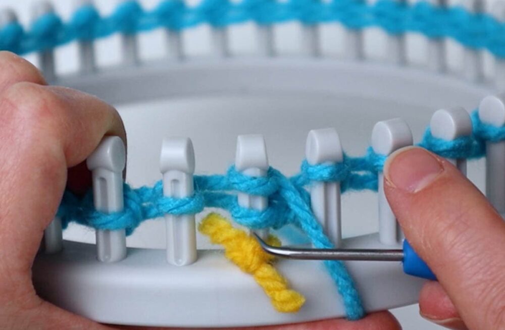 do an e-wrap knit stitch for the first peg