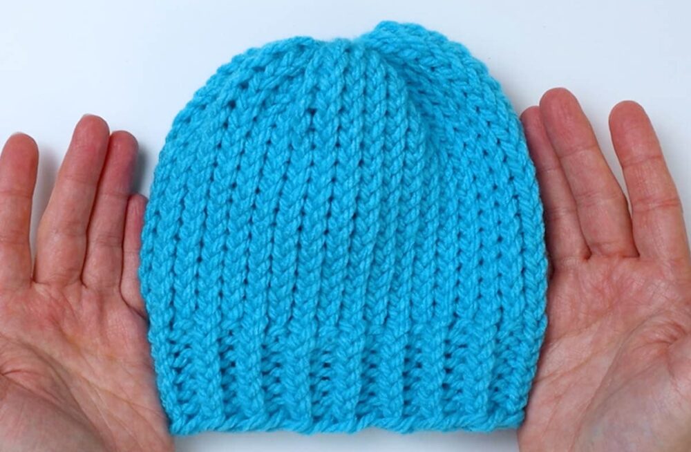 How to Loom Knit a Baby Hat (in 2 Sizes!) Marching North
