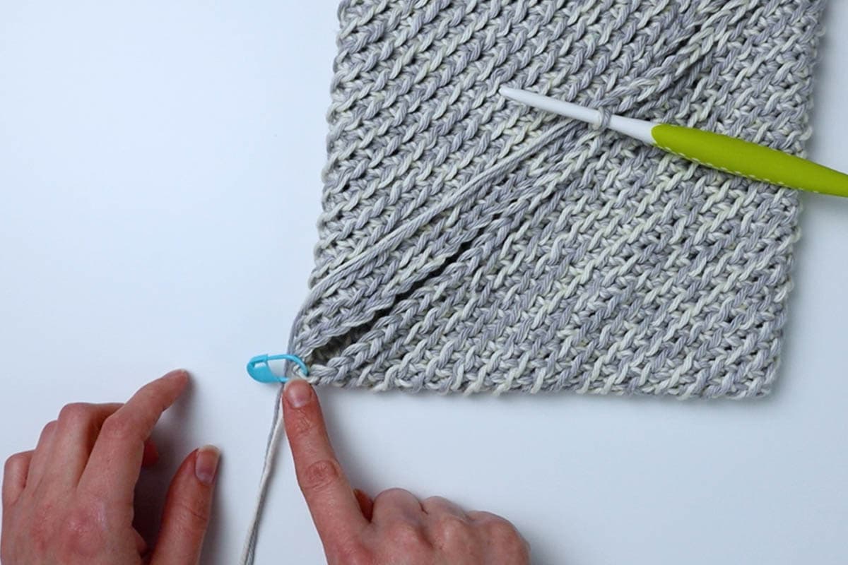 place a marker in the corner of the potholder so you know where to stop crocheting