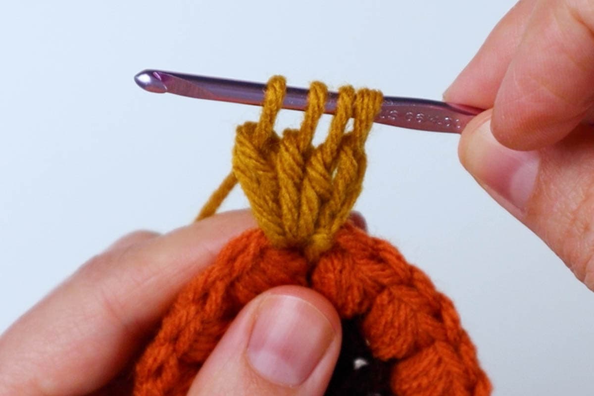 four loops on hook for first cluster stitch