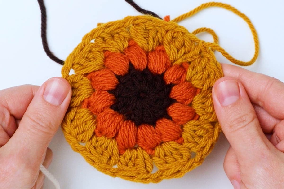 third round of sunburst granny square complete