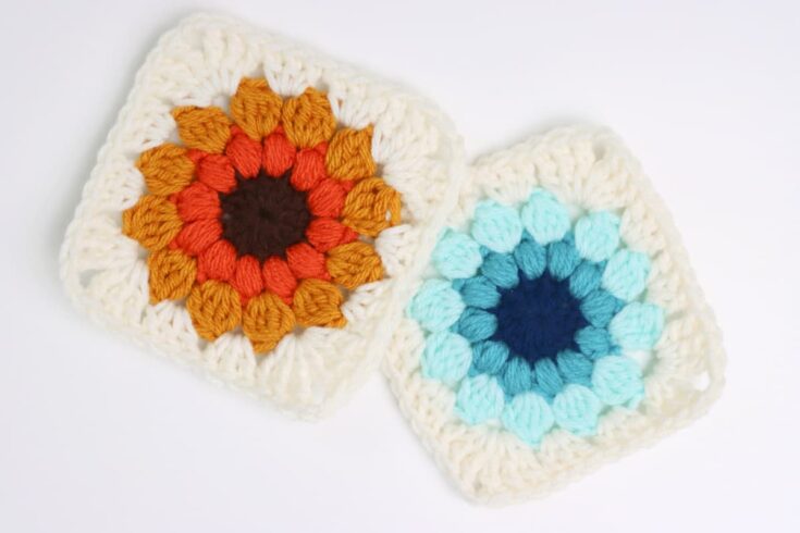 finished sunburst granny squares in blue and orange