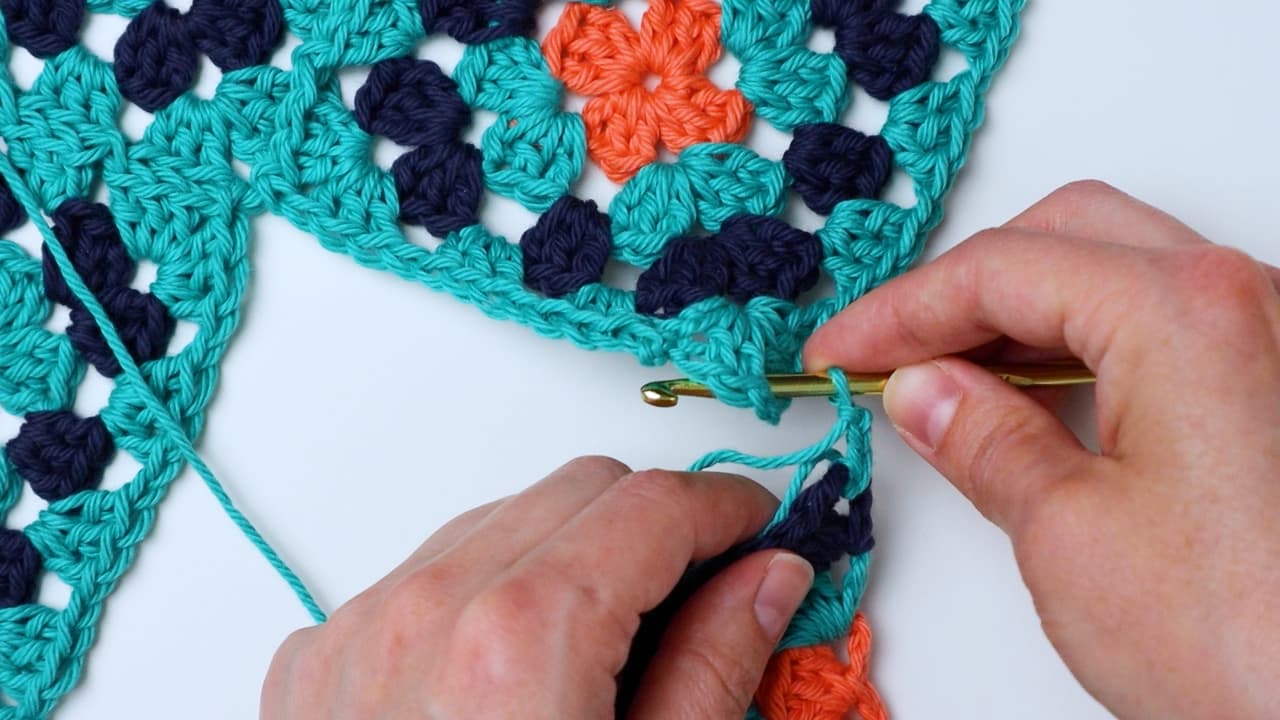 attaching the triangle to the granny square