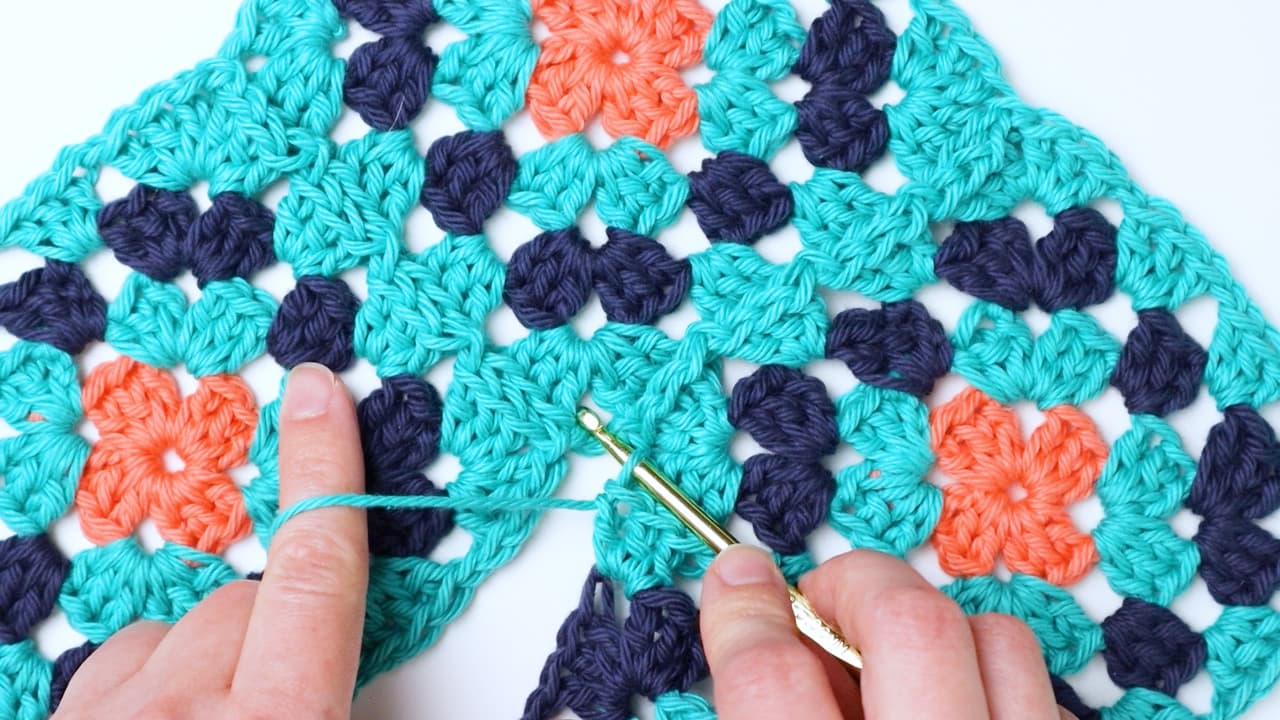 attaching the corner of the granny triangle