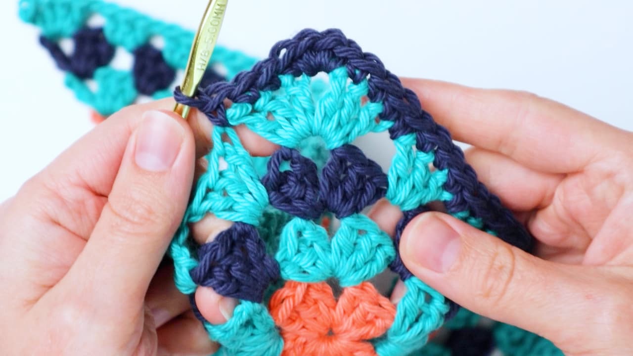 make 3 single crochet in the corner