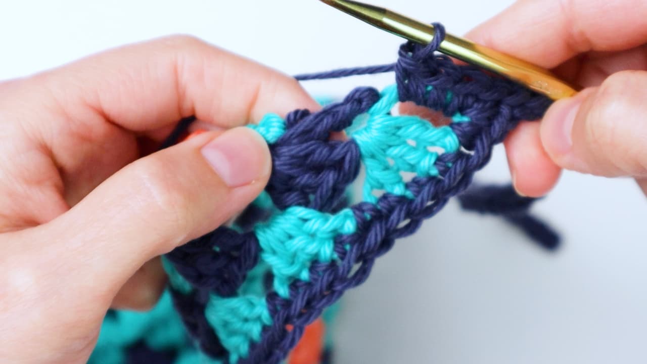 make three single crochet in the first space