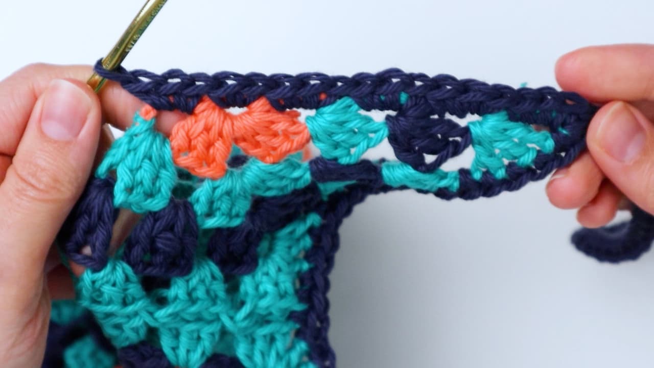 crochet front border of granny square bandana