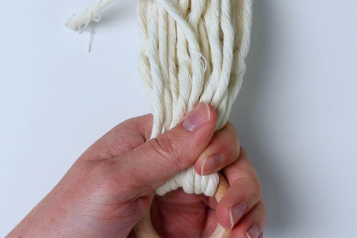 fold the cords up to tie the wrapping knot