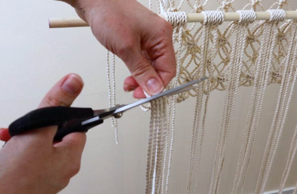 cutting the excess cord off at the 6 inch mark