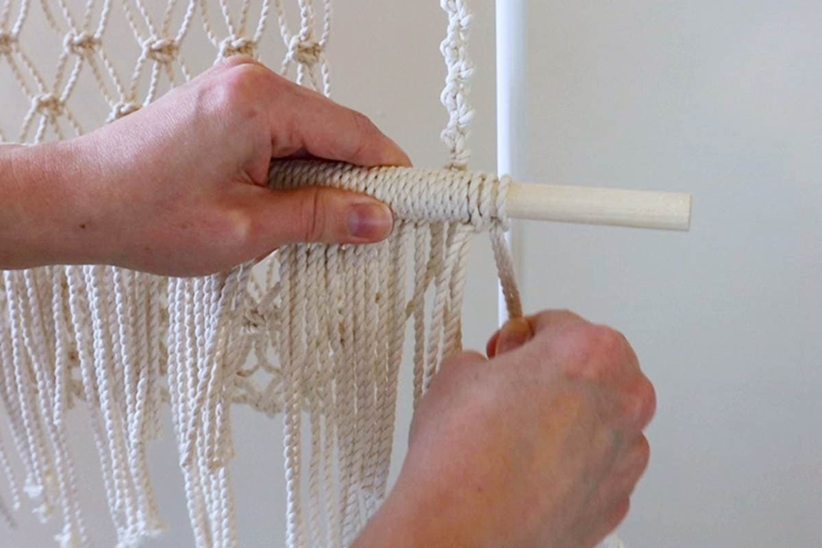 attaching the last few pieces of fringe