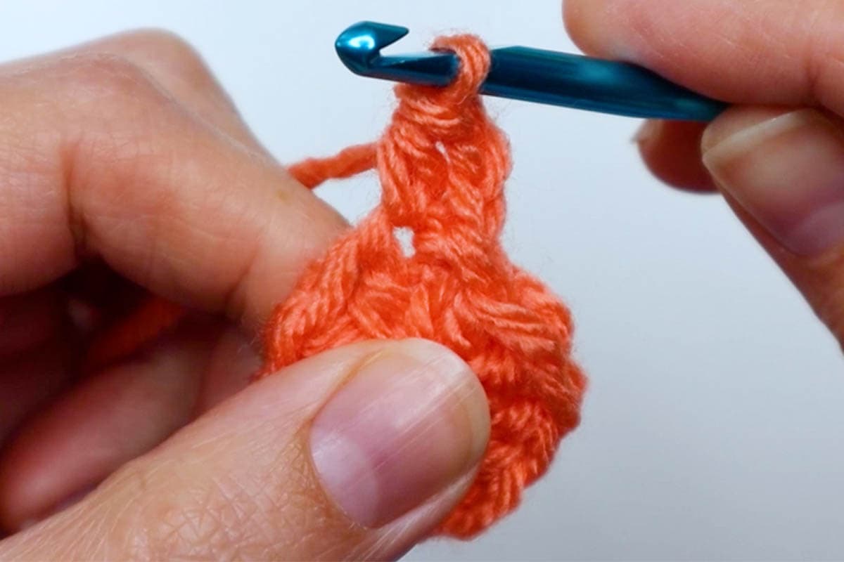 half double crochet in the same stitch as chain