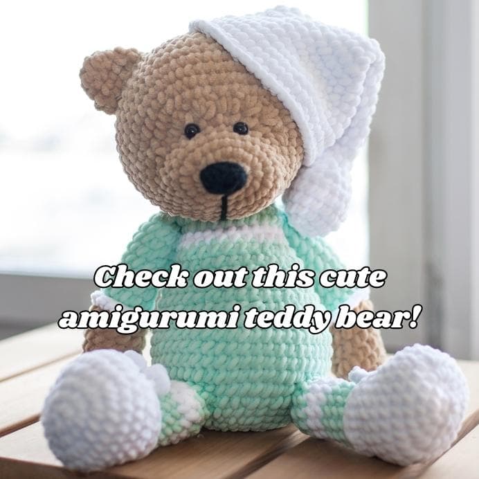 Cute amigurumi teddy bear on a wooden table