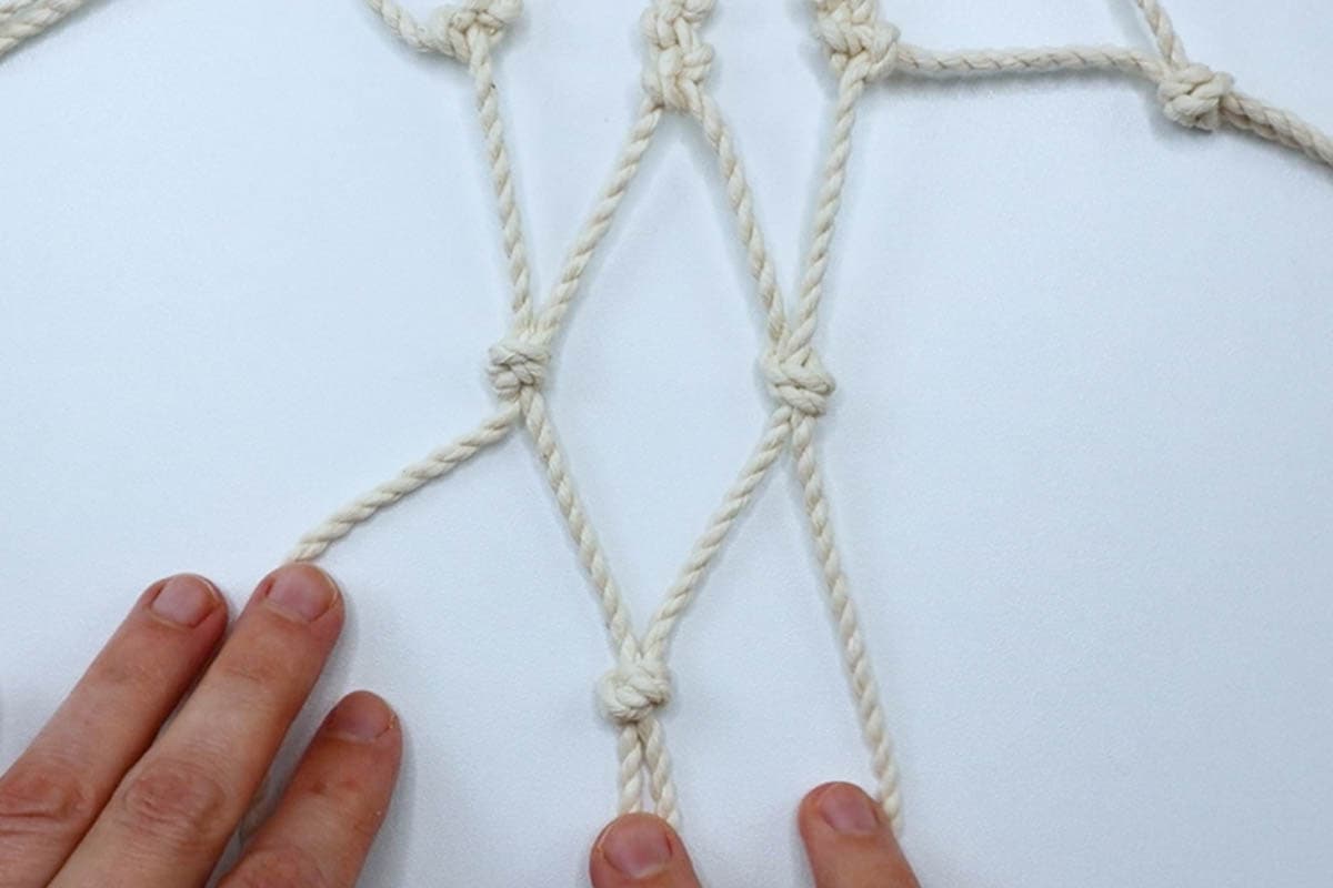 tie the second row of overhand knots