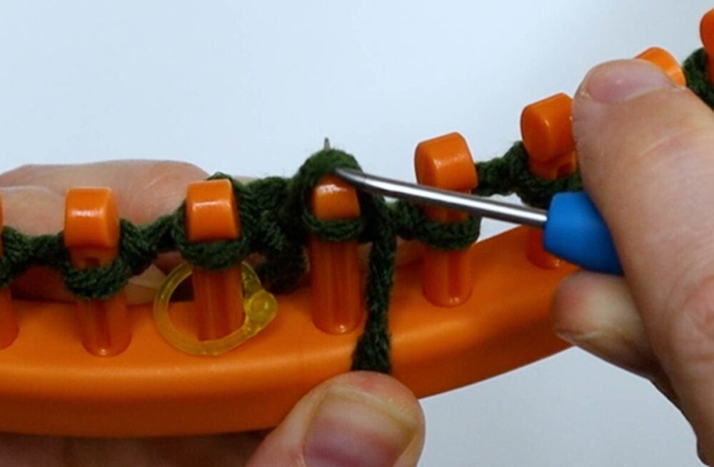 pull bottom loop over the top loop