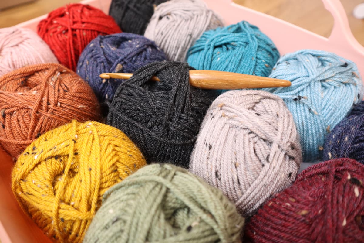 Brava Tweed yarn in a basket