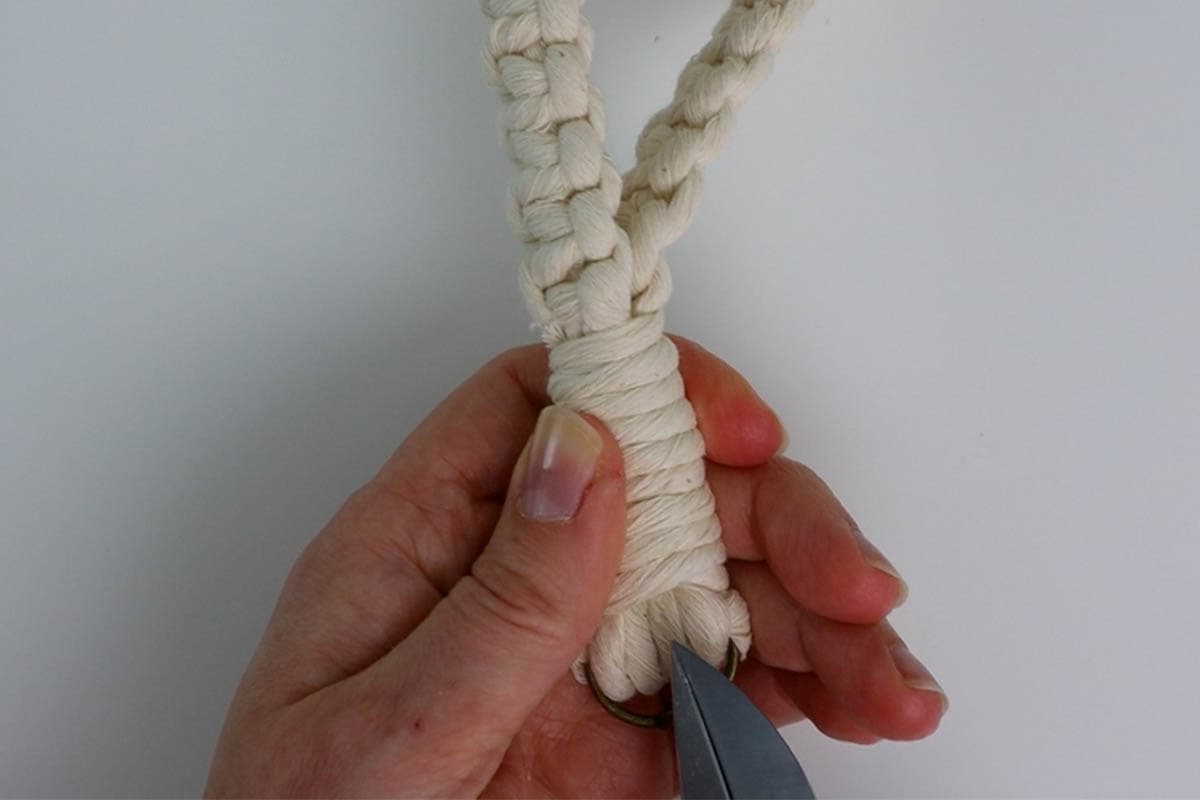 finished wrapping knot, poking the ends in place