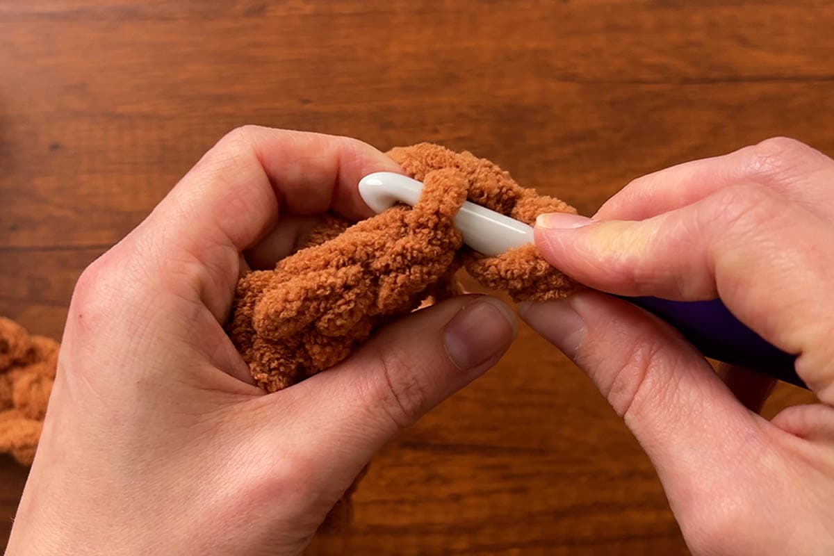 inserting hook under the back loop only