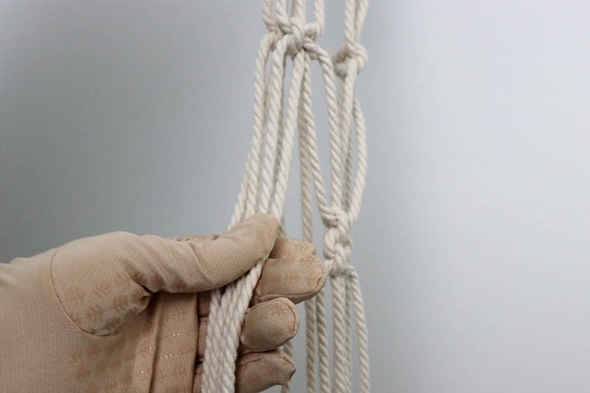getting ready to do two square knots on the left side