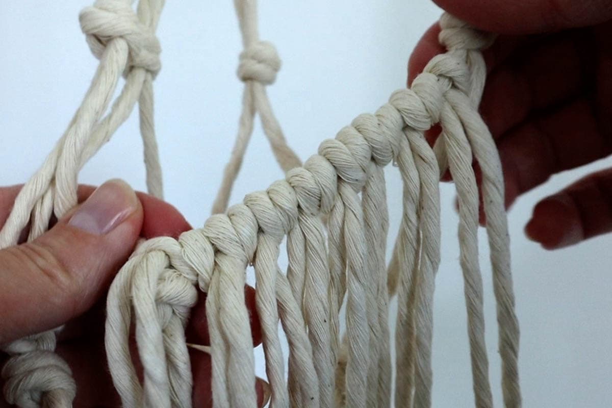 attaching rest of the fringe with cow hitch knots