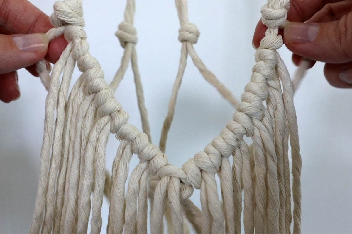 attaching rest of the fringe with cow hitch knots