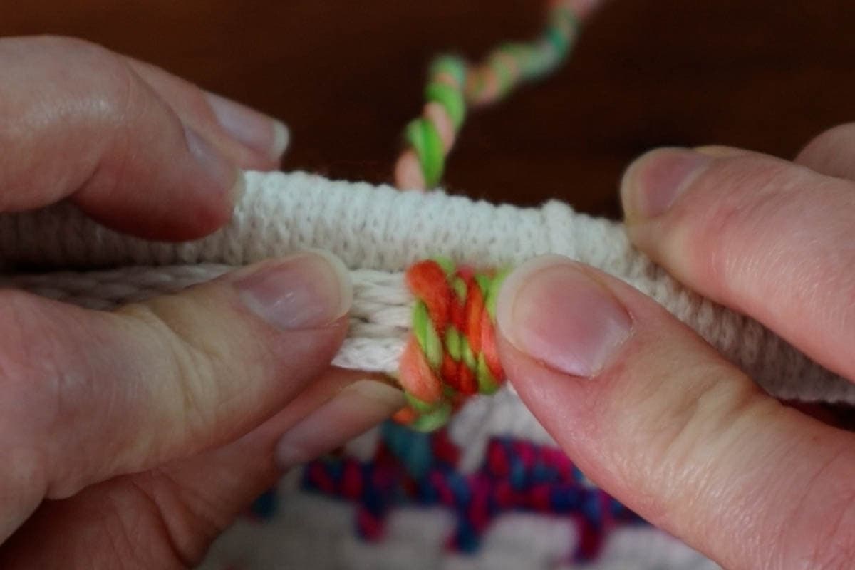 holding the filler cord on top of the previous row