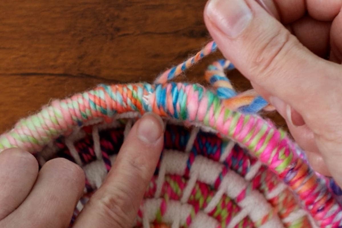 wrapping around the end of the filler cord to finish off the basket