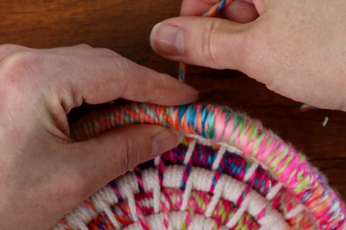 wrapping around the end of the filler cord to finish off the basket